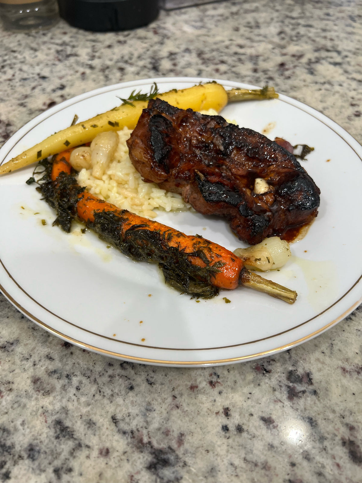 Marinated Pork Chops with Rice Pilaf and Honey Lemon Carrots
